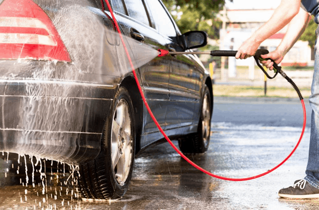 A man washing a car, How Often You Should Wash Your Car